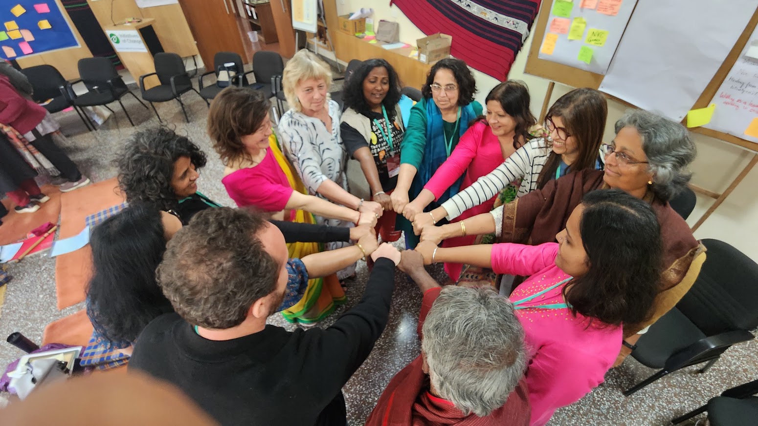 people putting their hands together